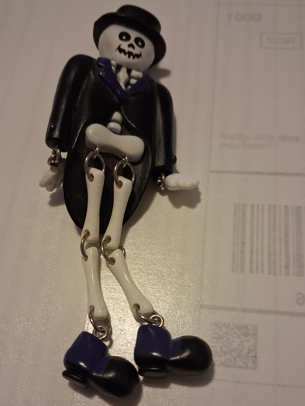 Hallmark Black and White Skeleton Brooch with Purple Accents